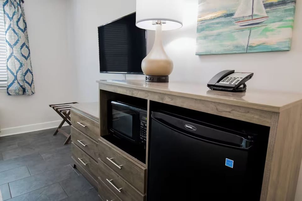 Enjoy easy snacks and cold drinks with fridge and microwave.