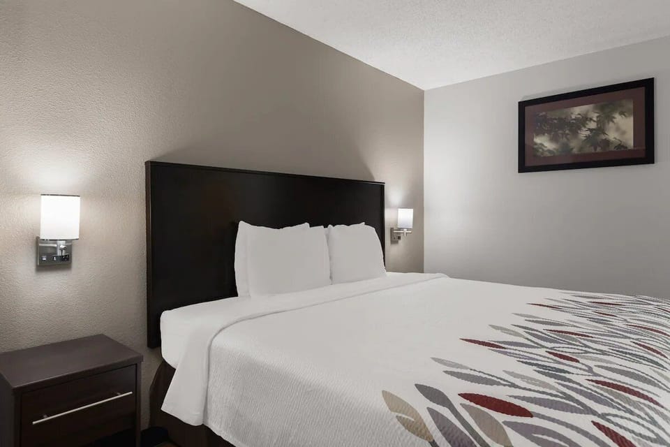 Drift off under soft bedside lighting and crisp, clean linens