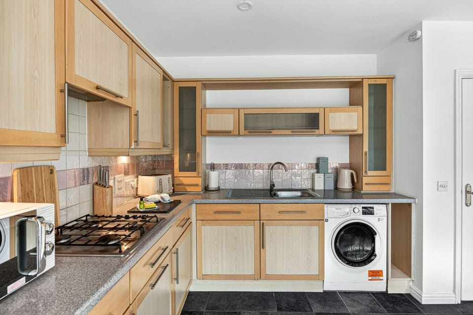A fully equipped kitchen, complete with everything you need to prepare a home-cooked meal.