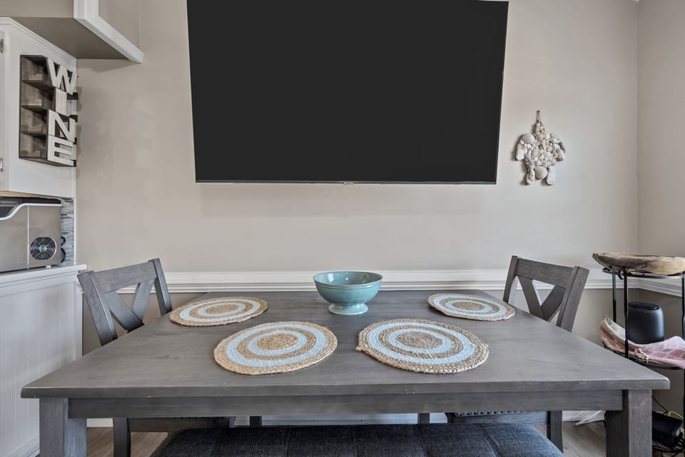 Dining table with seating for meals, games, or work
