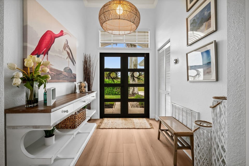 A warm and inviting entry welcomes you into Casa Botanica - step inside and feel instantly at home as your Naples getaway begins.