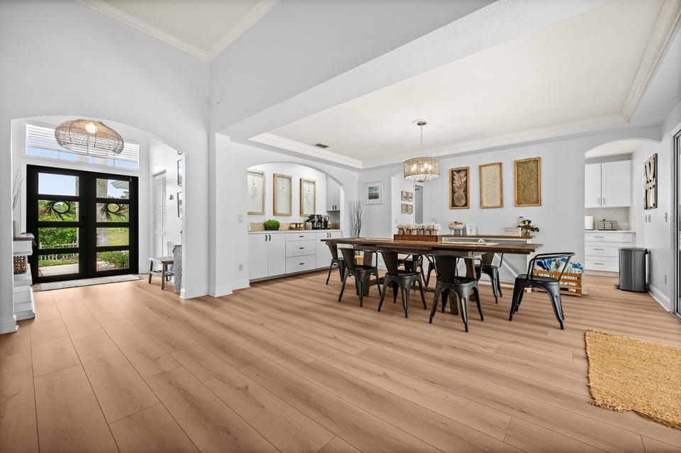 Step inside to a bright, welcoming entry that flows seamlessly into the dining area - perfect for gathering, sharing meals, and settling into your Naples retreat.