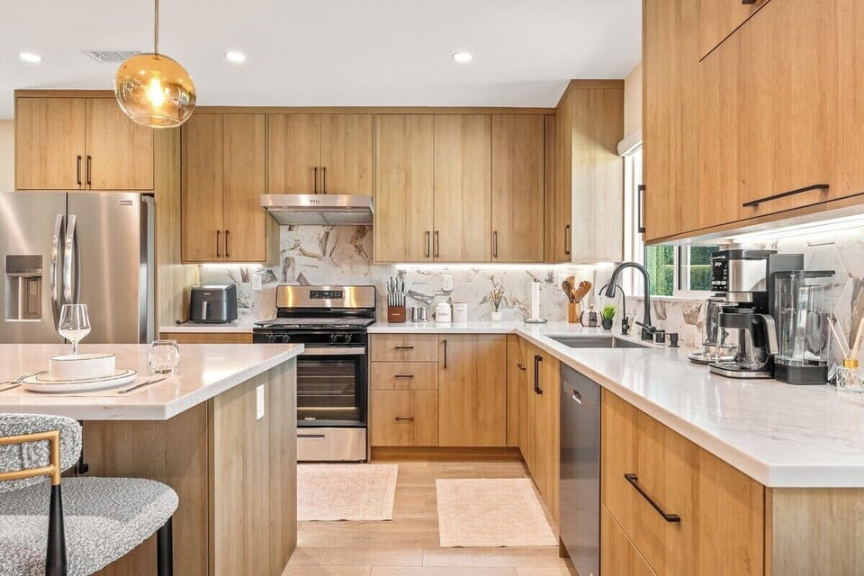 Cook, dine, and unwind in this bright, open-concept chef’s kitchen.