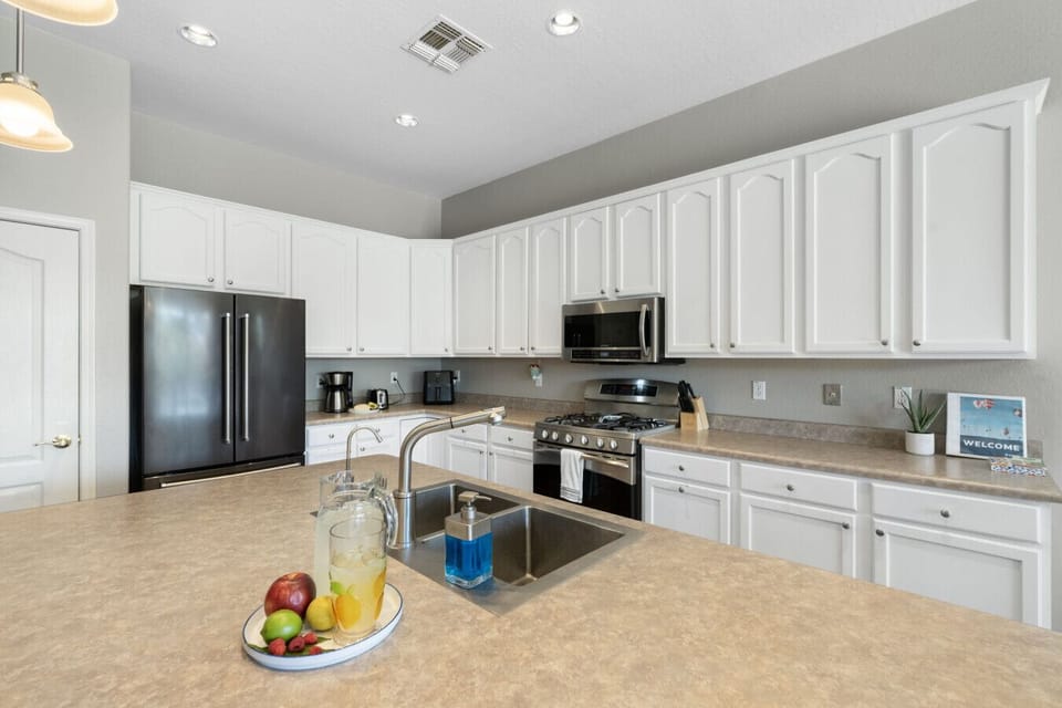 Kitchen | Stainless Steel Appliances | Island Sink & Cabinet Storage