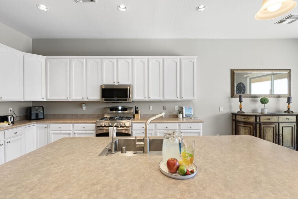Kitchen | Breakfast Bar Countertop | Pendant Lighting & Backsplash Finish