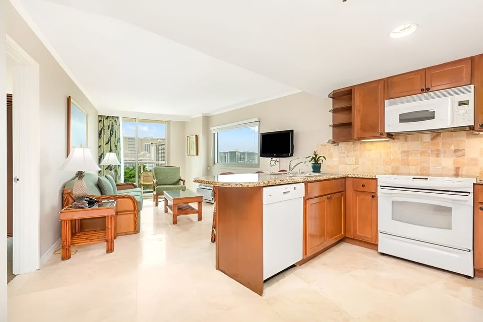 Cook easy meals in a sunny, open-concept kitchen.