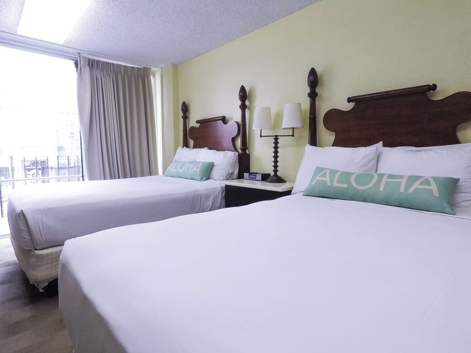 Lounge in soft beds and enjoy relaxed, laid-back island vibes.