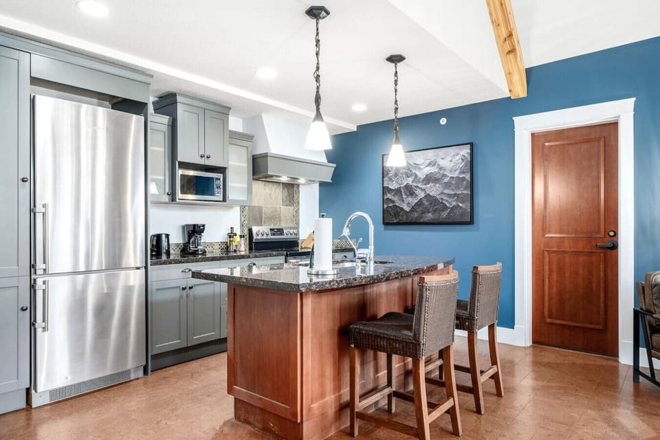 Cook, entertain, and gather in the open kitchen area.
