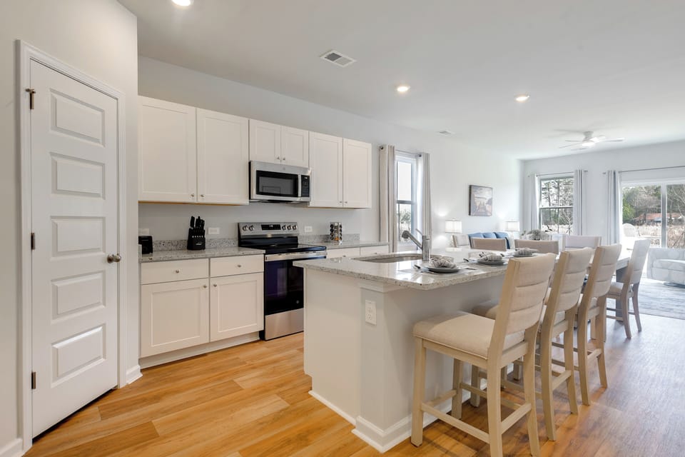 Breakfast Bar Now Has 3 Chairs (Photo from Next Door Unit)