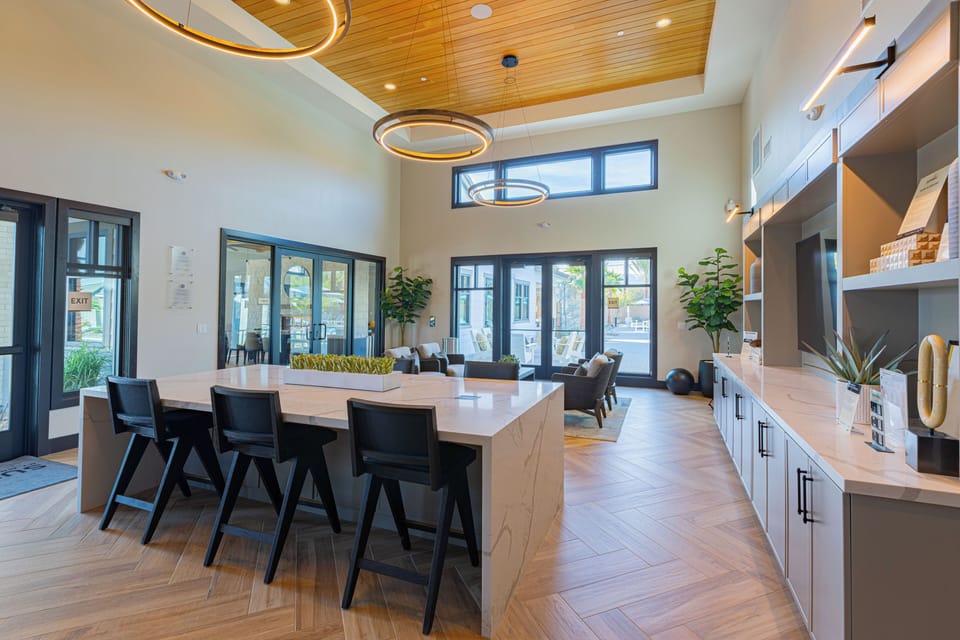 The heart of the community: a gourmet Clubhouse kitchen and social hub.