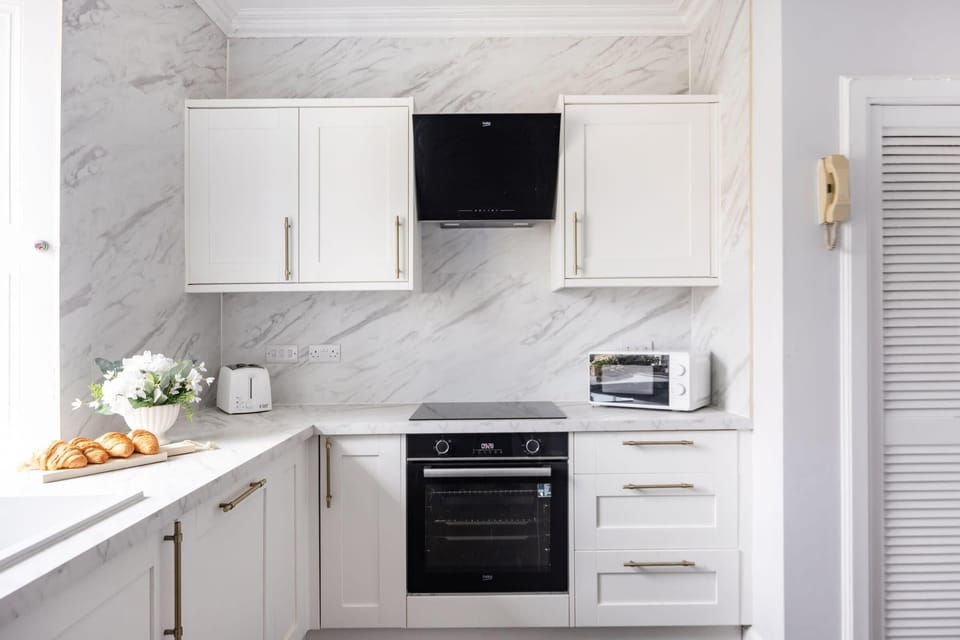 The kitchen is fully equipped to prepare a simple meal 