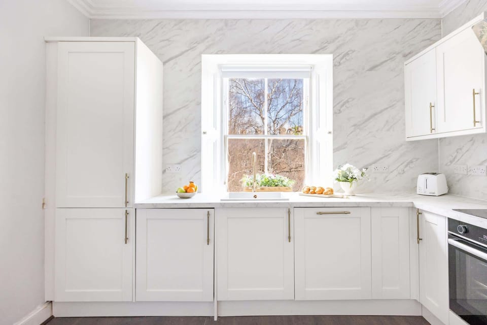 The kitchen is fully equipped to prepare a simple meal 