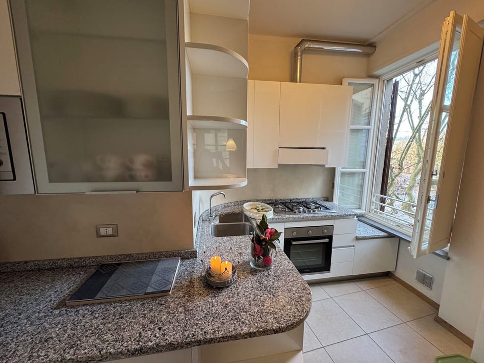 Kitchen, Kitchen Appliance, Countertop, Major Appliance, Interior Design, Home Appliance, Cabinetry, Flooring, Room, Lighting