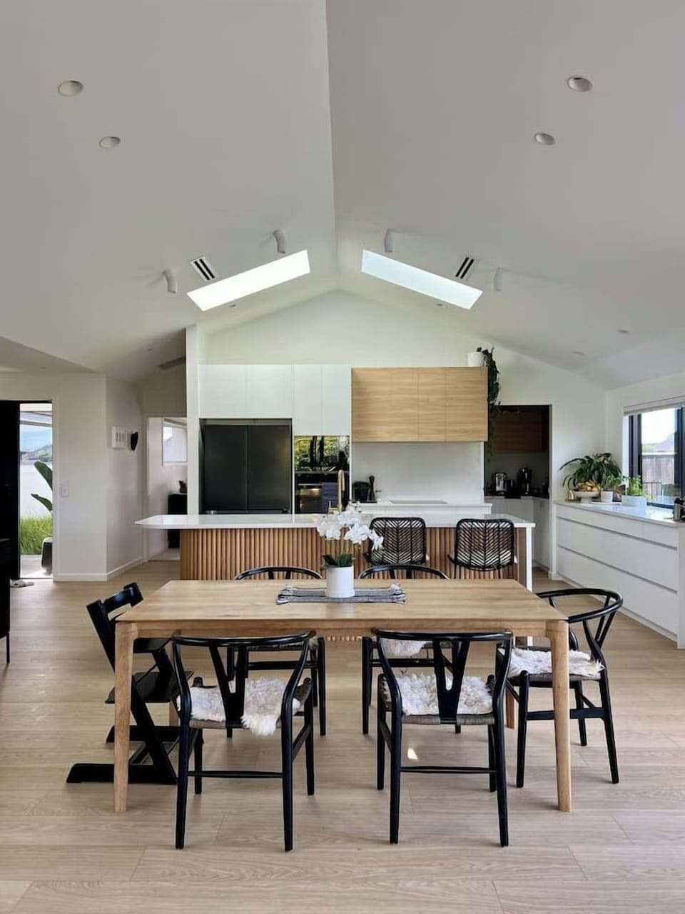 Open plan living, kitchen and dining.