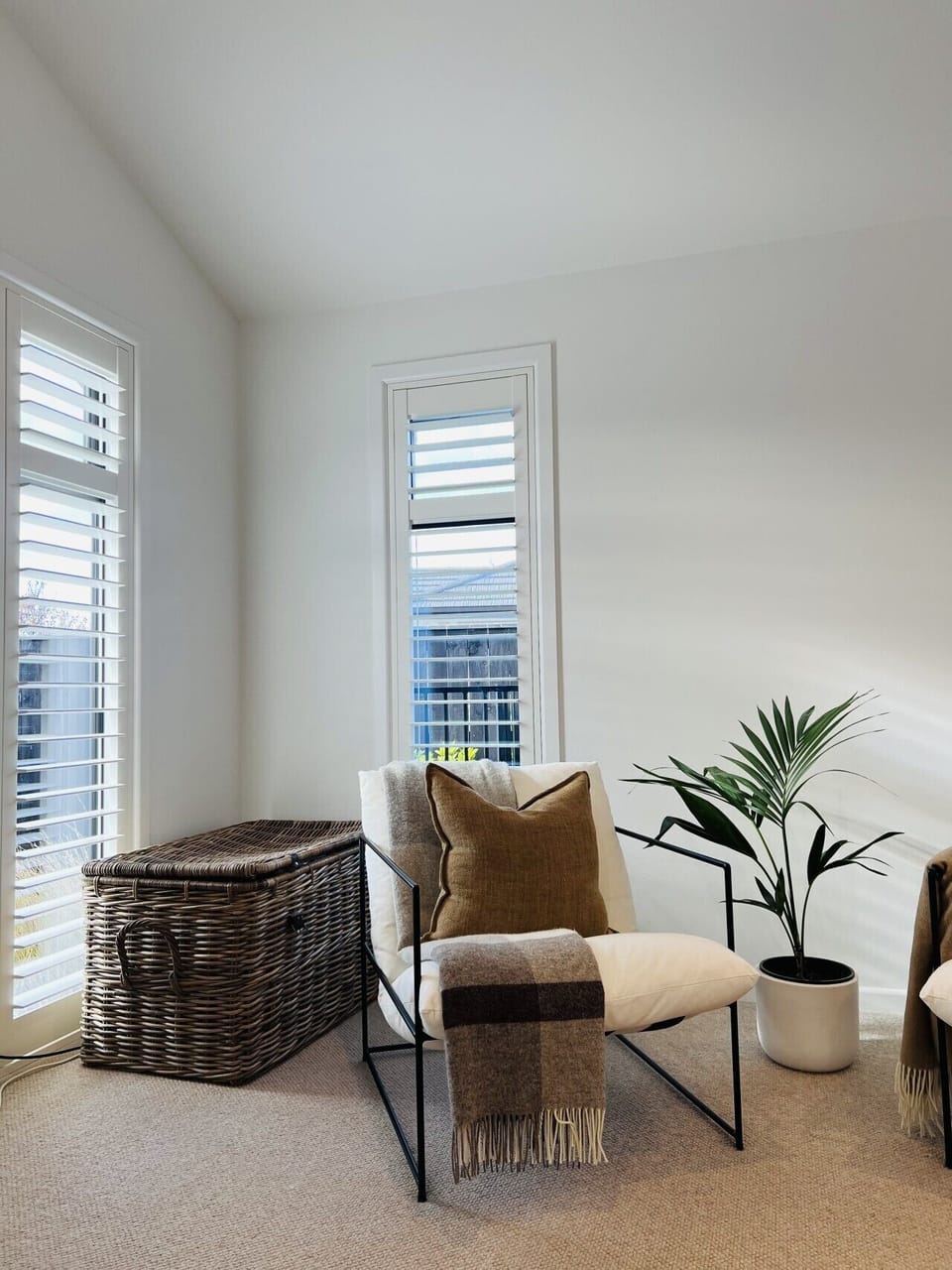 Lounge room with smart TV and cosy couches