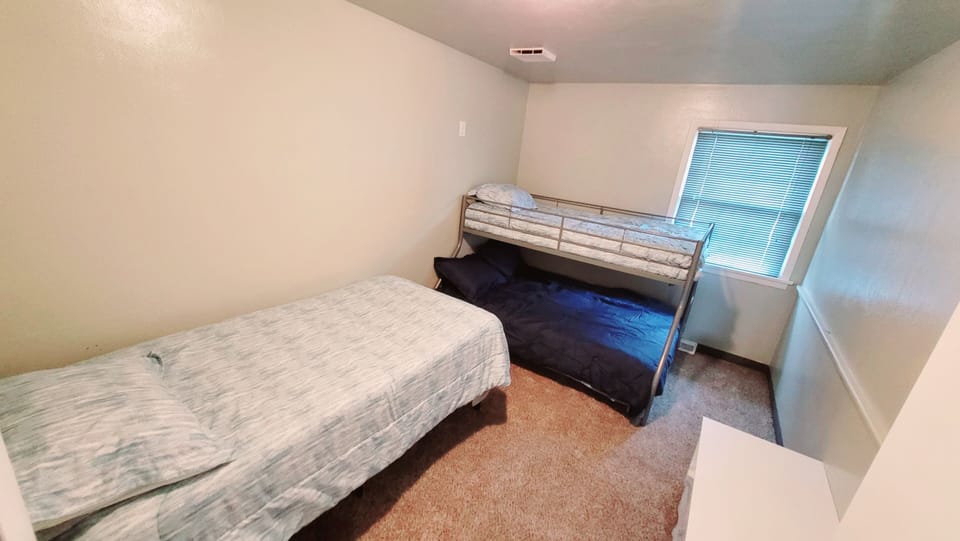 Bunk bed has a full on bottom and twin top. 1 single twin