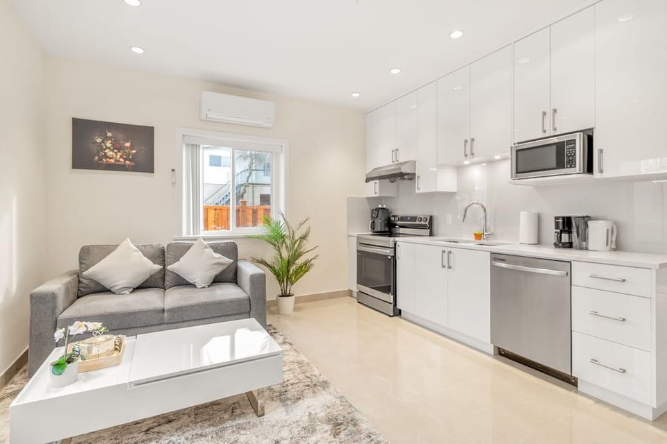 Cozy living room by the kitchen, perfect for relaxing and family time.