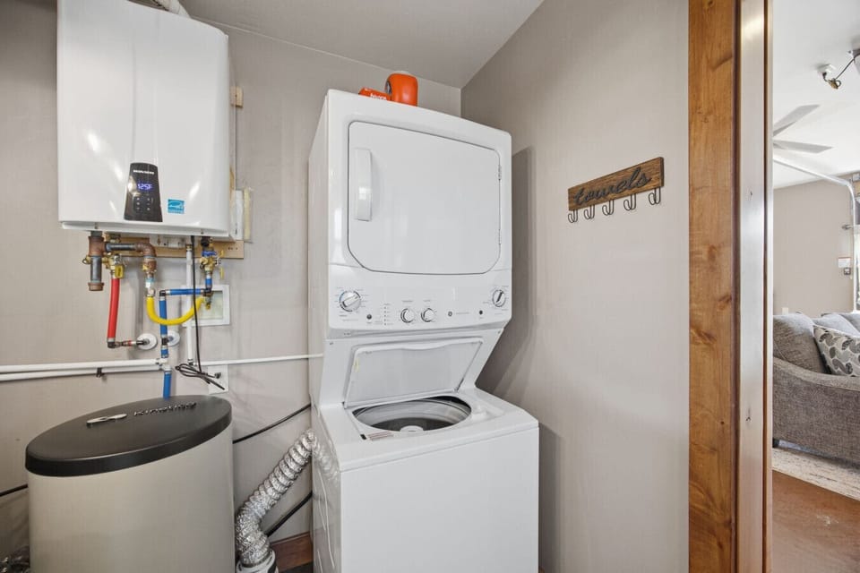 In unit washer and dryer and water filtration system