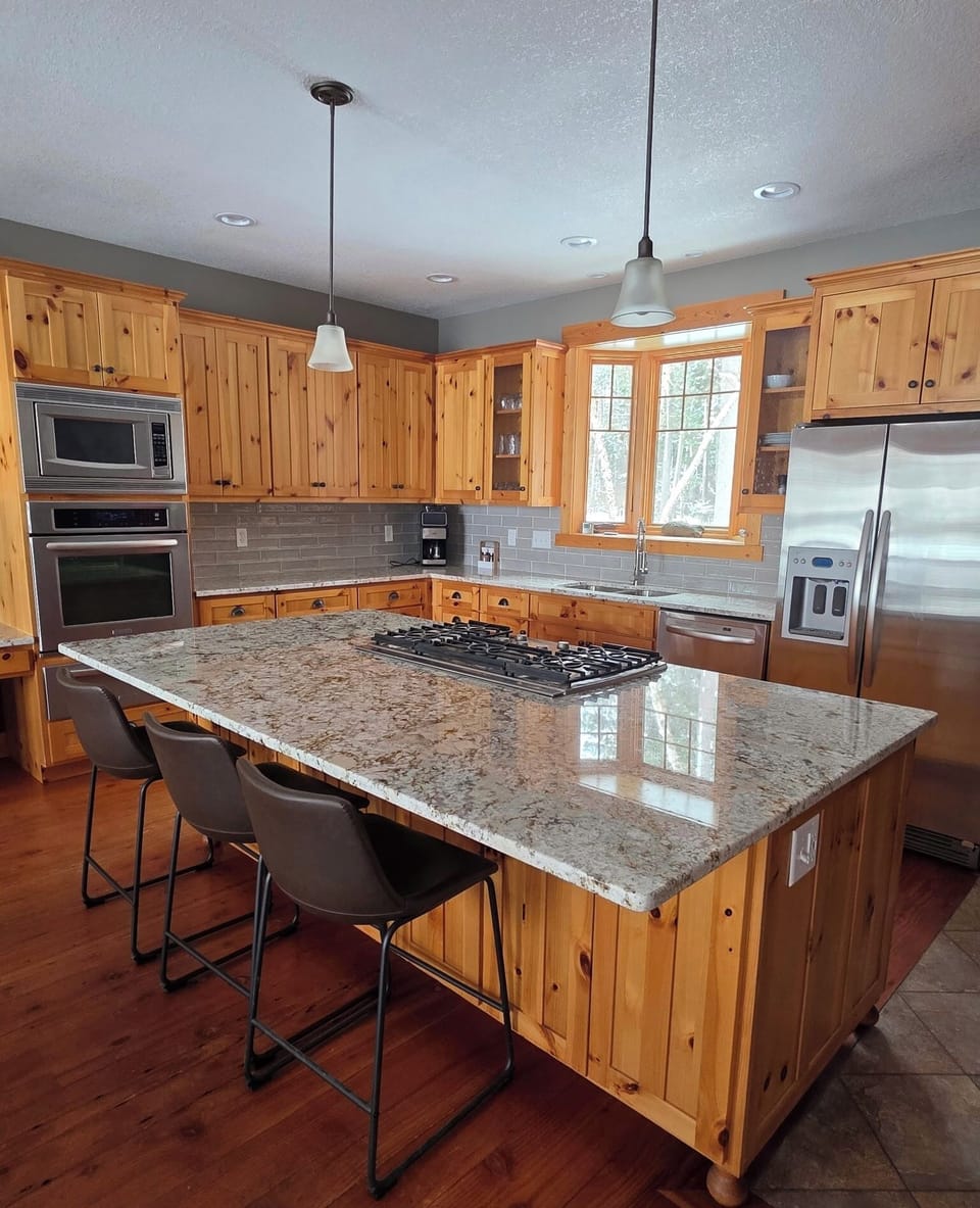 Newly remodeled kitchen blends modern and rustic.