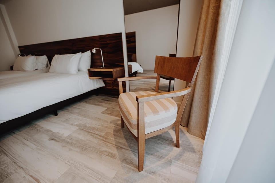 Lounge by the window with a comfortable armchair retreat.