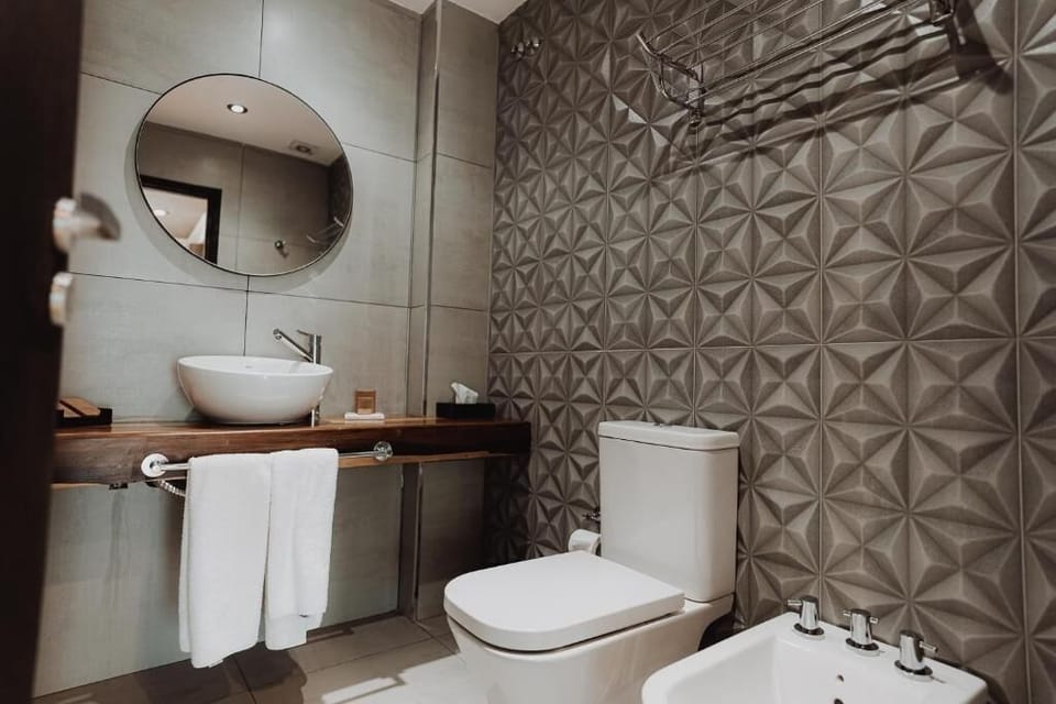Freshen up in a modern bath with sleek textures.