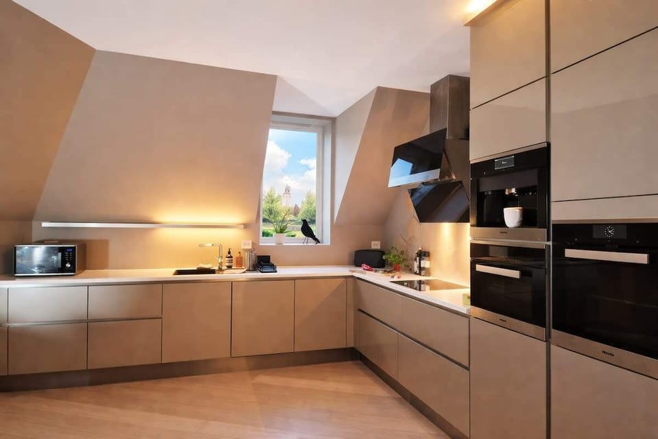 Spacious and fully equipped kitchen, with a nice view. 