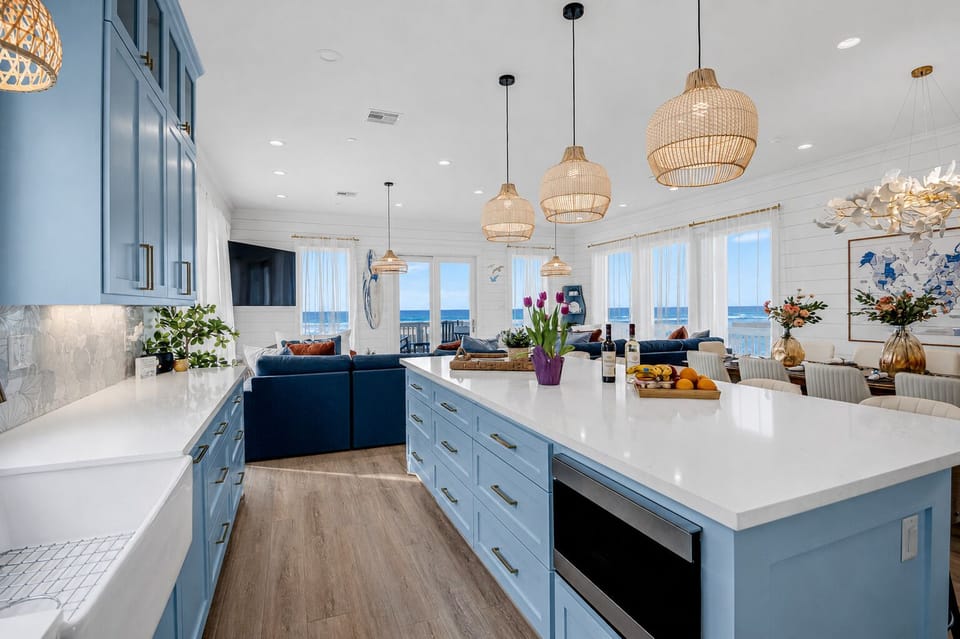 Fully stocked kitchen with high-end stainless steel appliances.