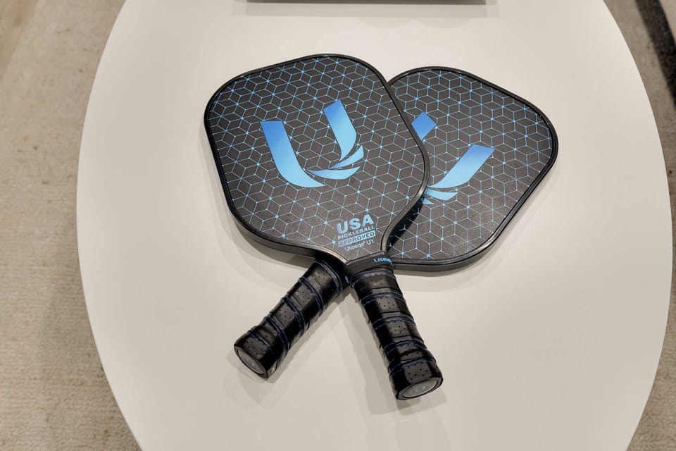 Pickleball paddles are packed and ready — just grab them and walk over to the neighborhood courts for a quick match before dinner.