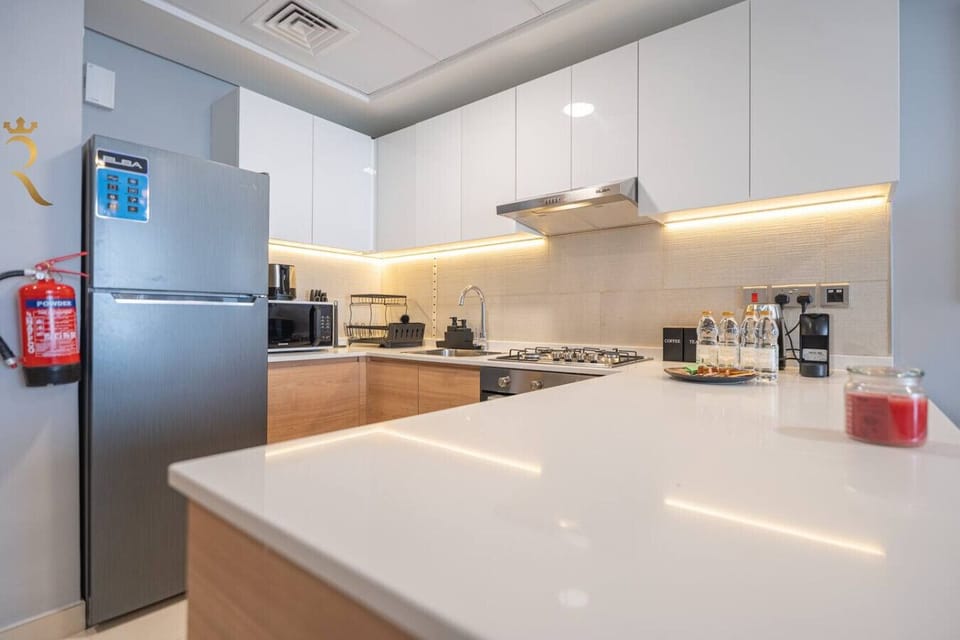 Fully Equipped: Includes stove, oven, microwave, refrigerator, and all essential cookware and utensils for effortless meal preparation.