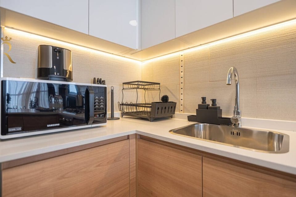 Functional & Modern: Sleek countertops, ample storage, and modern appliances make cooking convenient and enjoyable.