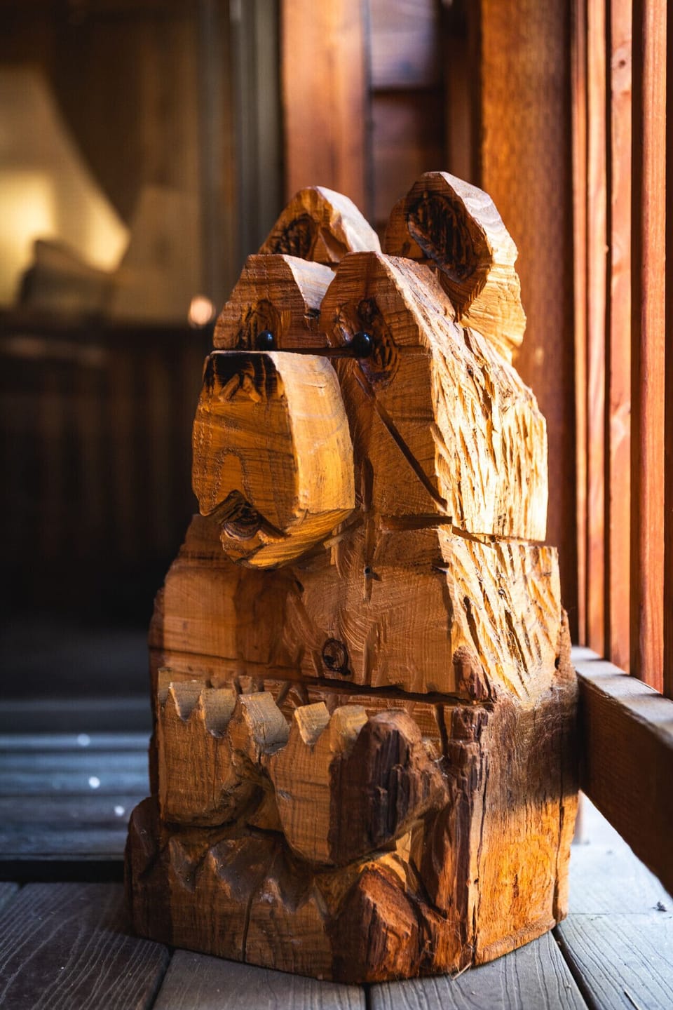 Say hello to our resident hand-carved wooden bear.