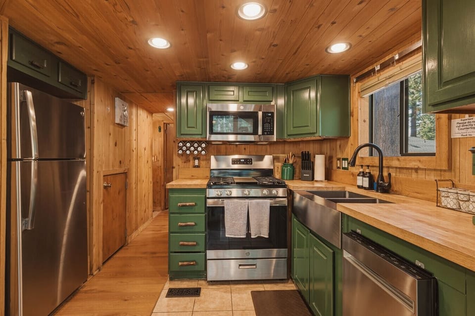 Enjoy a clean, functional kitchen designed for both quick bites and full meals after a day exploring Lake Tahoe. Thoughtfully laid out with modern essentials and cozy cabin charm.