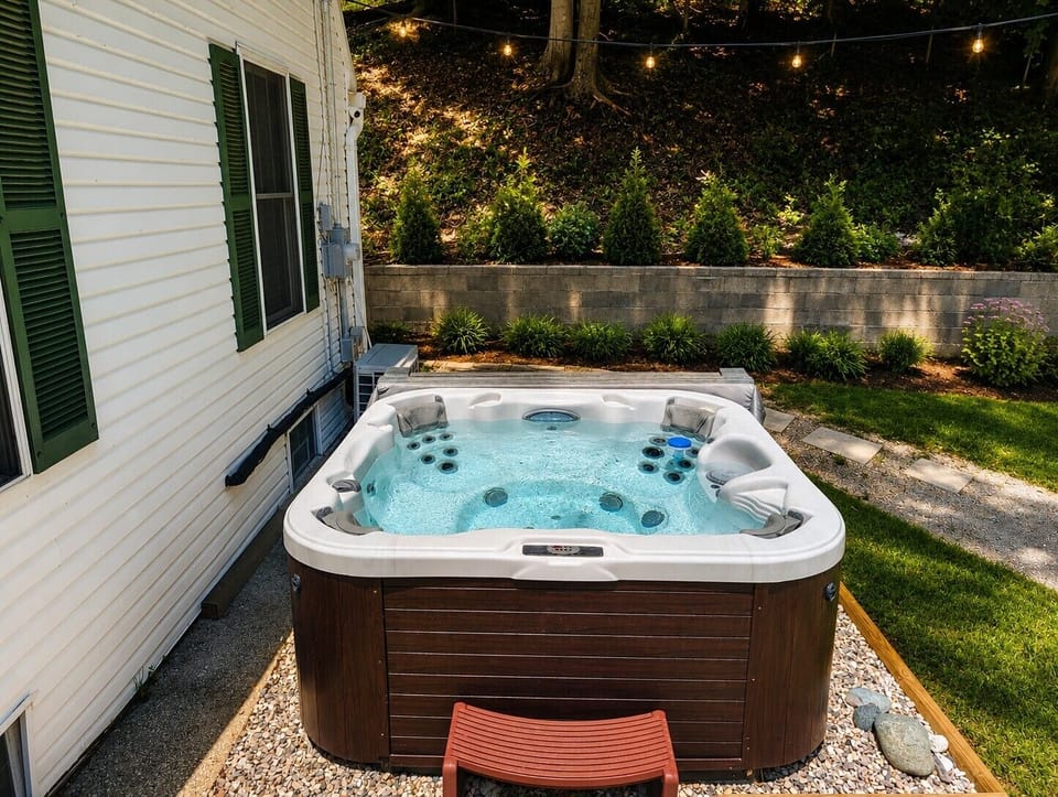 EXTERIOR:  The relaxing hot tub on the front patio.