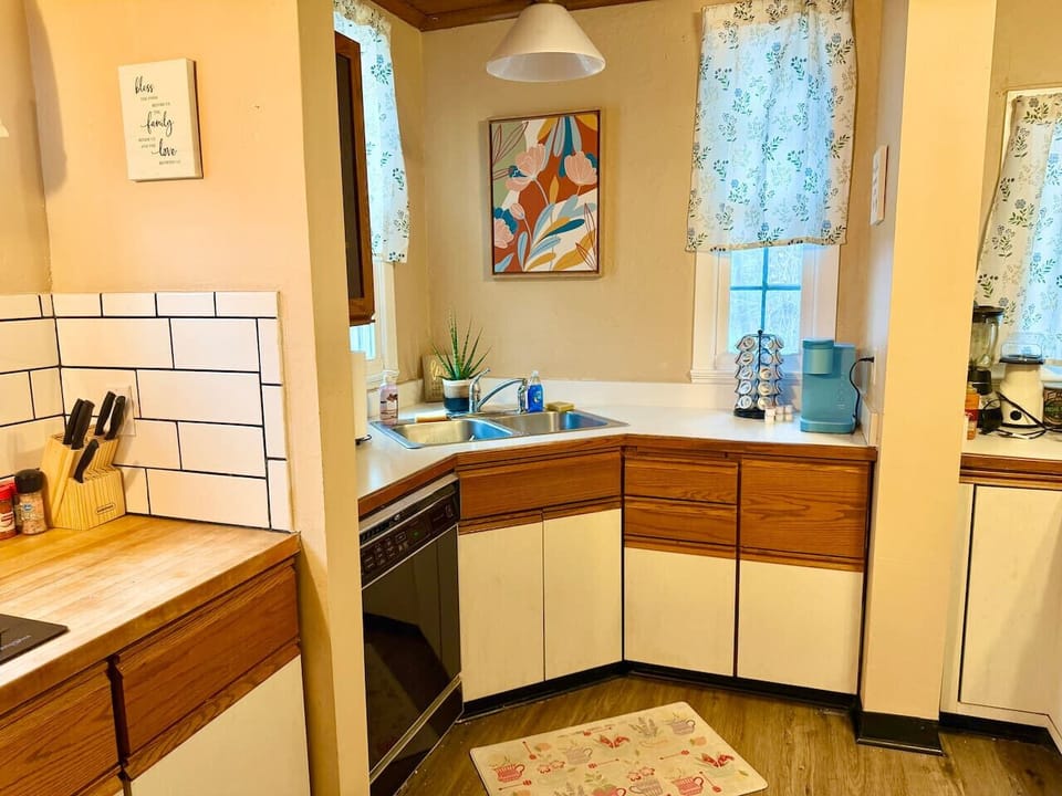 Bright, functional kitchen with ample counter space and cabinetry for storage. Features modern appliances and a practical layout, making it easy to cook, gather, and enjoy everyday meals.