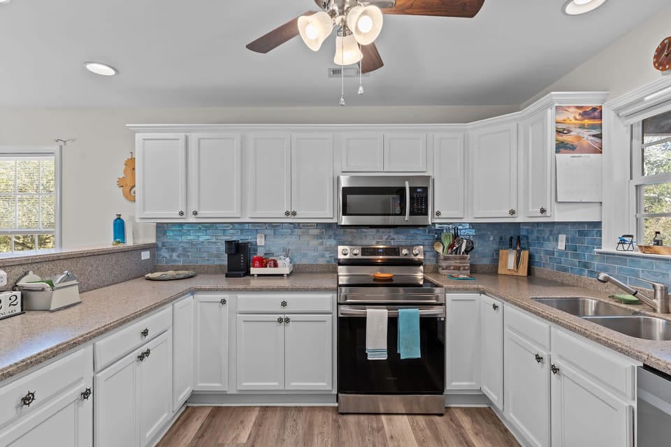 “Updated kitchen with full appliances and ample counter space”