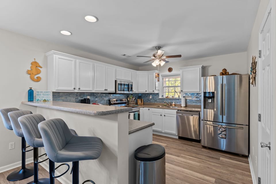 “Fully equipped modern kitchen in Oak Island vacation rental”