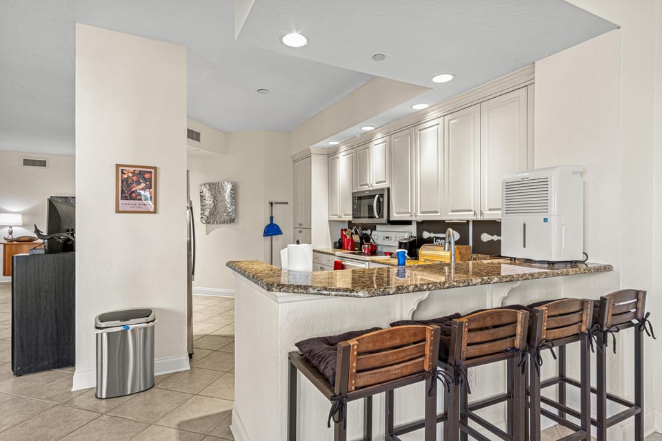 Bright, open kitchen with spacious island and modern seating