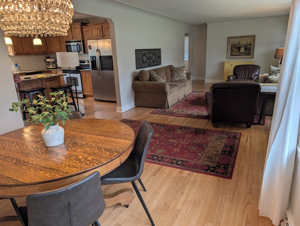 Dining area with kitchen and living room.