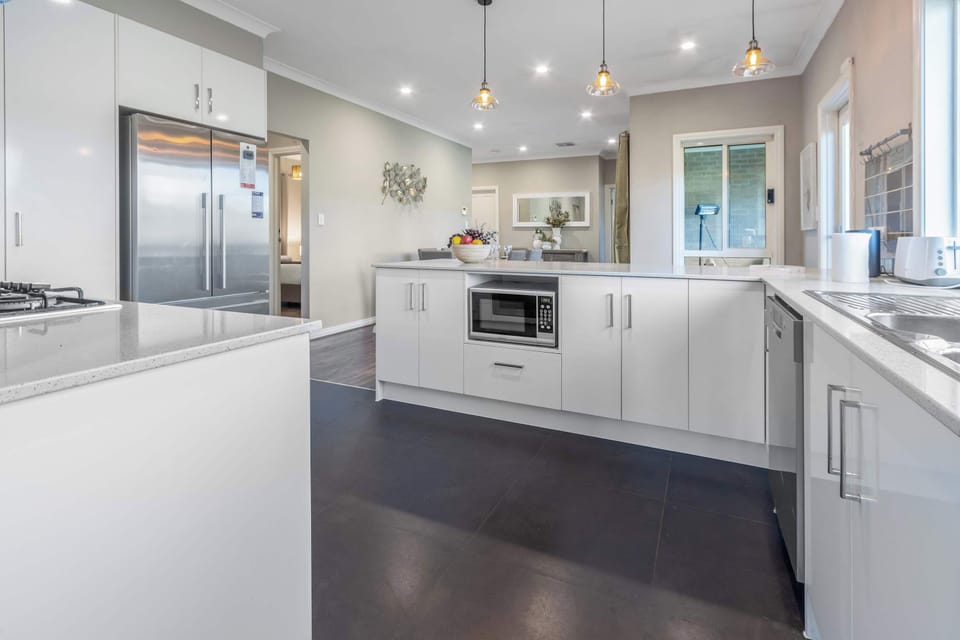 Kitchen comes complete with dishwasher, microwave and family size fridge/freezer
