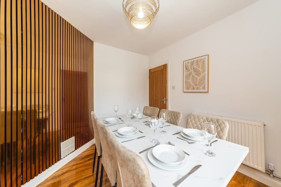 Dining table with room for six. Meals together, morning coffees, laptop work. One table, multiple uses. Just like home.