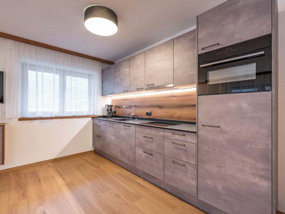 Wood, Flooring, Cabinetry, Interior Design, Countertop, Kitchen, Furniture, Floor, Home Appliance, Kitchen Appliance