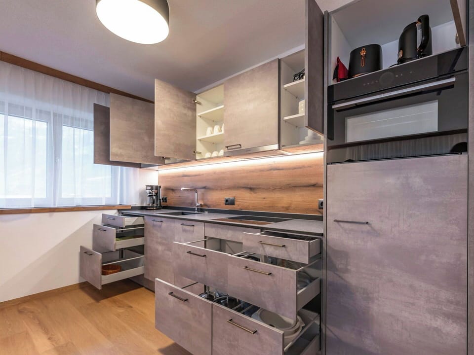 Cabinetry, Countertop, Furniture, Kitchen, Kitchen Appliance, Interior Design, Wood, Flooring, Drawer, Home Appliance