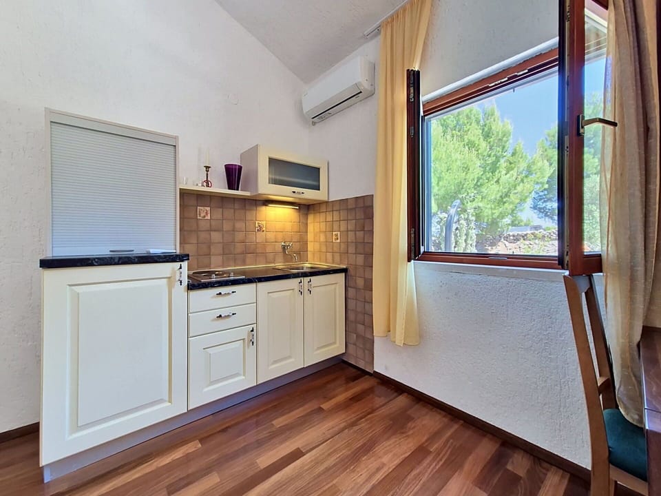 Wood, Interior Design, Flooring, Ceiling, Floor, Major Appliance, Room, Kitchen, Wood Stain, Hardwood