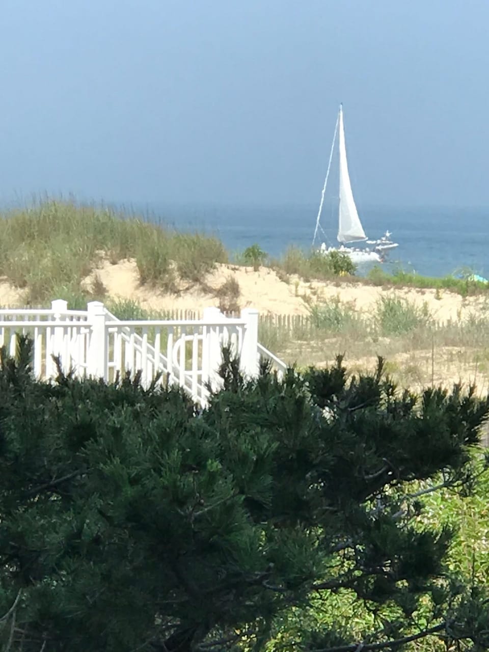 Spend your days enjoying Camelot’s resort-style amenities—play tennis or pickleball, relax by the pool, and walk straight onto the beach.