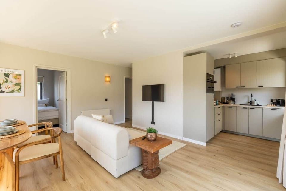 Open living space connected to kitchen. 