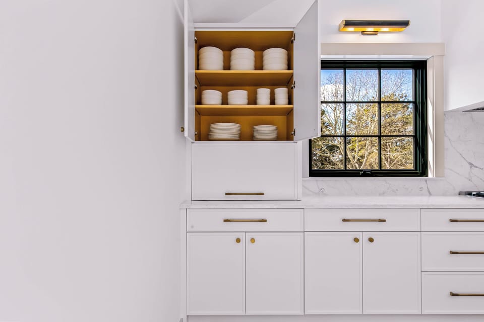 The pantry keeps things organized, so the space stays easy to use.