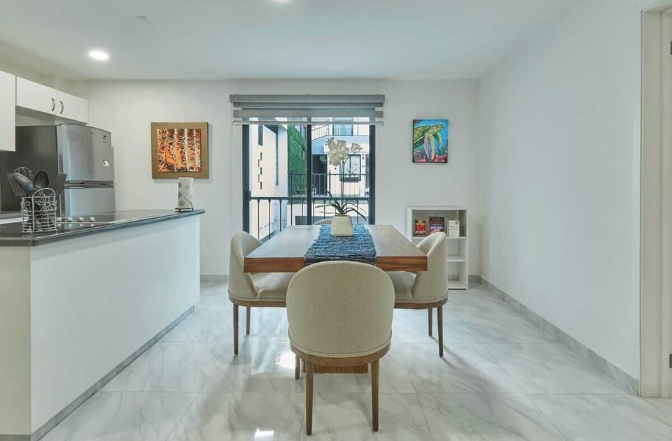 Open dining & living area flowing together for easy gatherings
