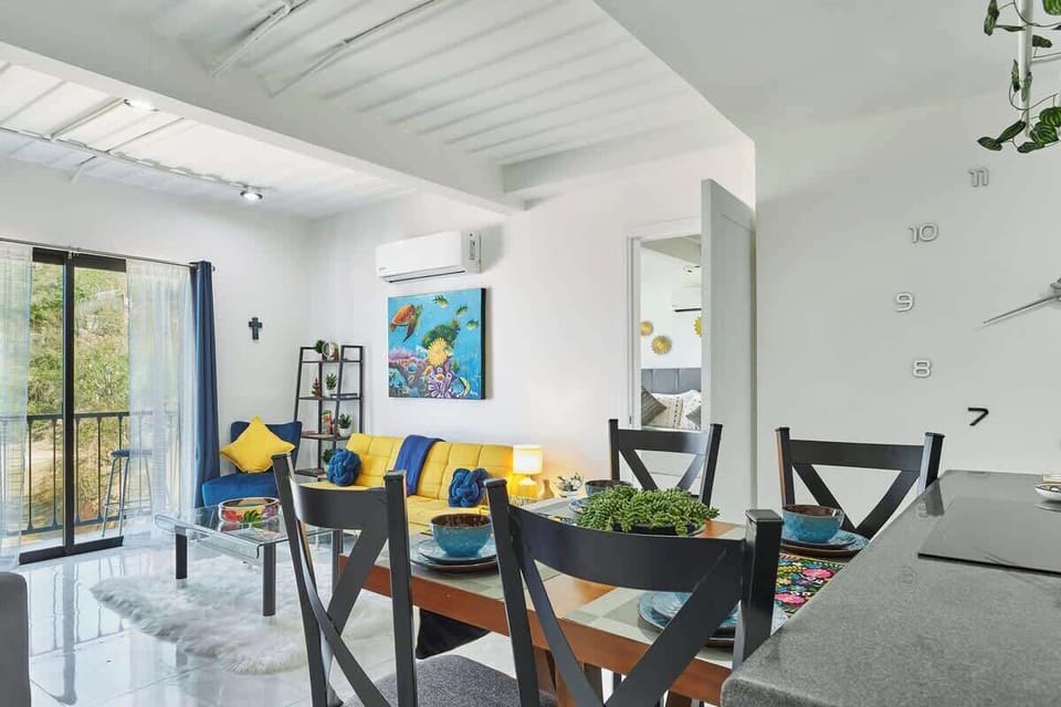 Open dining & living space w/ balcony access and plenty of natural light