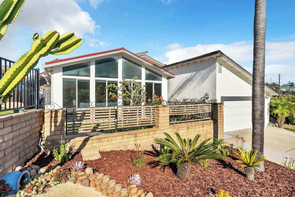 Home exterior. Full access to the driveway and garage. The driveway parking fits two cars.
