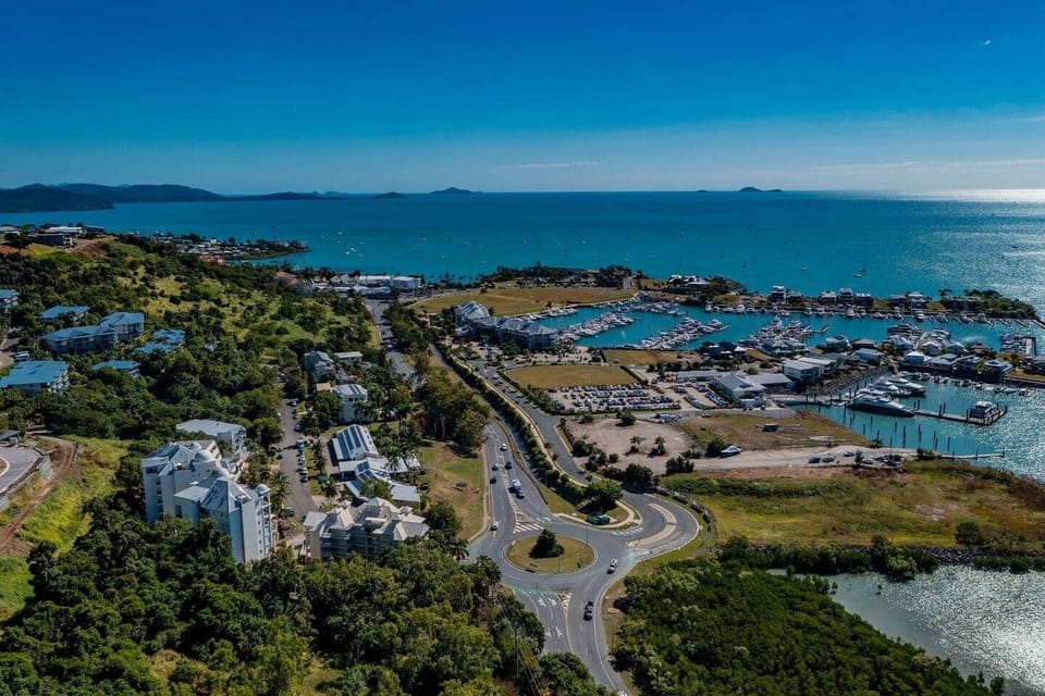 The Sebel in bottom left corner looking out to The Port of Airlie and sea views